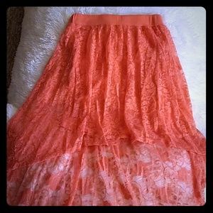 Short to long pink lace skirt.